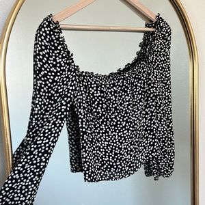 Reformation blouse with cinched wrists